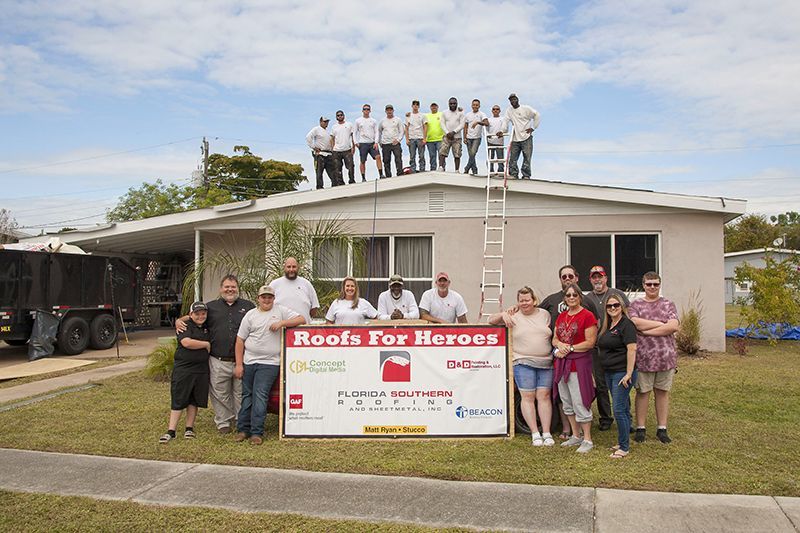 The team involved in the in the 2019 Roofs for Heroes donation.