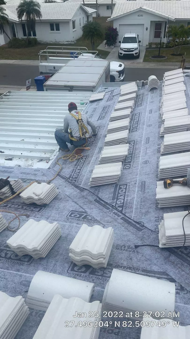 Before and after pictures of new plantings and mulch donated by Pestguard Commercial.